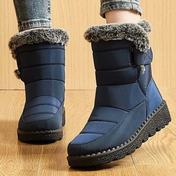 Chic women's waterproof winter boots with plush lining, low heel, and hook-and-loop closure for stylish cold weather comfort.