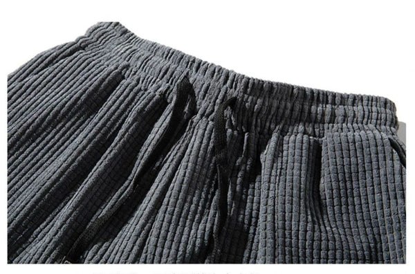 Thermal corduroy joggers with functional side pockets and elastic waist