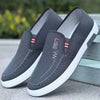 Men's gray canvas sneakers with cushioned EVA insole and moisture-wicking lining