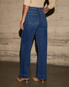 Chic high-waisted wide-leg jeans for women, featuring a relaxed fit, pockets, and subtle distressed details for modern style.