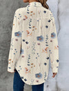 Elegant floral print women's blouse with batwing sleeves, perfect for everyday wear and versatile styling options.