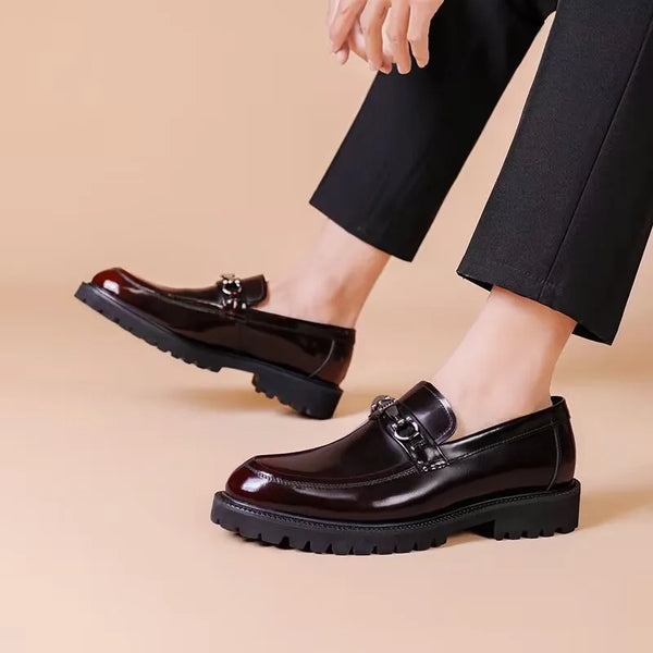 Polished black Oxfords with a classic silhouette for formal wear.