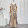 Backless midi dress in vibrant floral print, crafted from 100% linen for comfort and elegance.