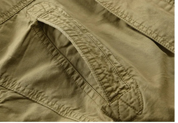 Classic men's trench coat in cotton, windproof design, hooded for protection, perfect for casual spring and autumn wear.