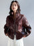 Chic vintage leather cropped jacket for women in black, made from genuine sheepskin.