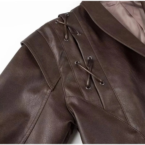Chic belted leather bomber jacket for women, featuring lace-up detail, hood, and notched lapel, perfect for autumn and winter
