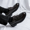 Stylish patent leather shoes for business meetings.