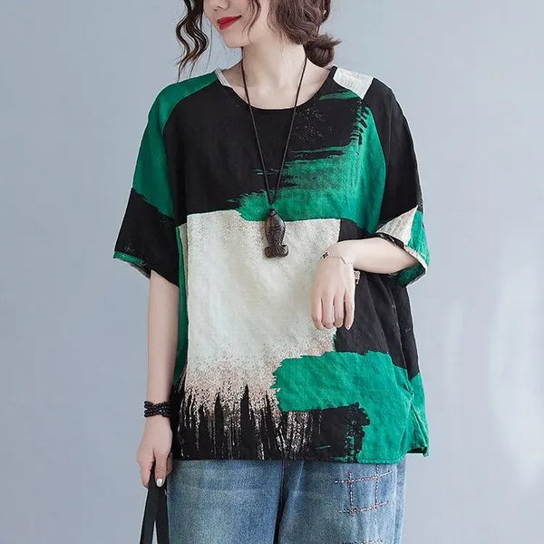 Sun-kissed look with this breezy linen tee in soft aqua.