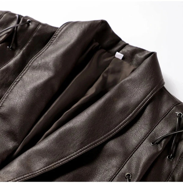 Chic belted leather bomber jacket for women, featuring lace-up detail, hood, and notched lapel, perfect for autumn and winter