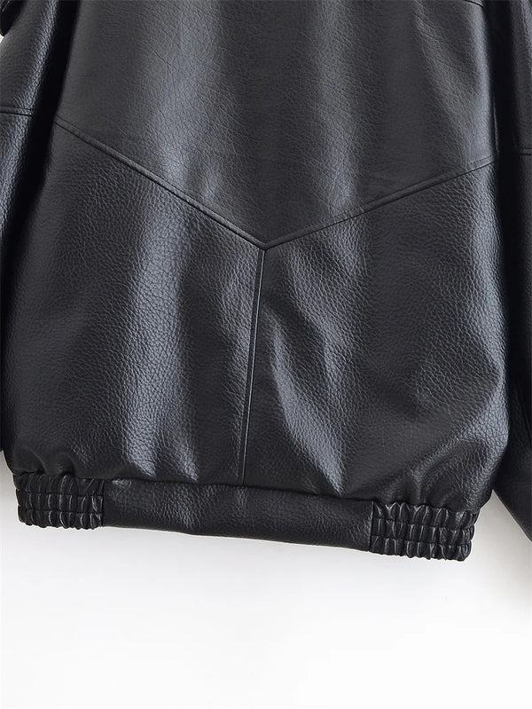 Chic black faux leather moto jacket for women, perfect for autumn evenings and stylish casual wear with functional pockets.