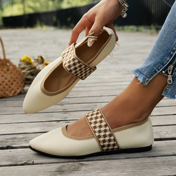 Women's knitted pointed toe flats featuring modern color-block pattern and slip-on design