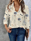 Elegant floral print women's blouse with batwing sleeves, perfect for everyday wear and versatile styling options.