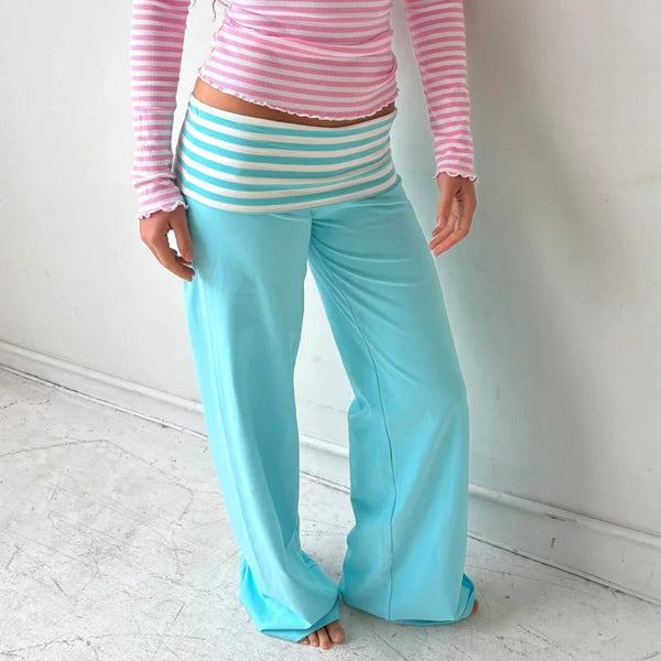 Versatile striped pants transitioning from sleepwear to casual wear