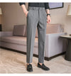 Men's slim fit dress pants in British style with elastic waist, perfect for casual or formal occasions, made from polyester b