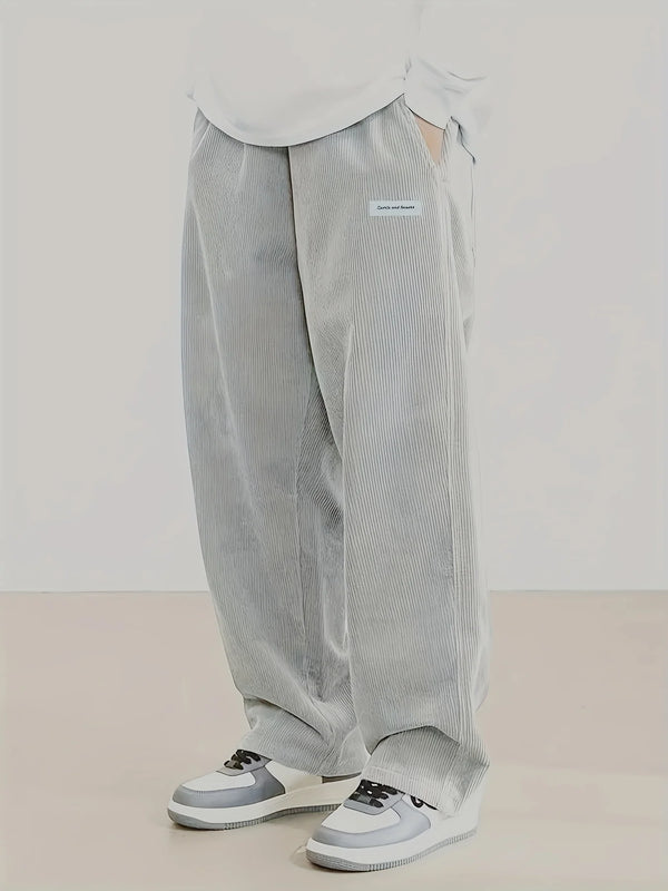 Full-length polyester corduroy pants with elastic waist and relaxed fit for everyday wear