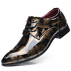 Top-down view of elegant floral men's shoes with lace-up closure.
