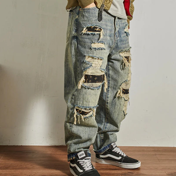 Back view of Rebel Spirit Distressed Jeans featuring classic pockets and rugged design.