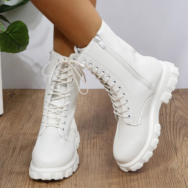 Chic white ankle boots with chunky heel, PU leather, lace-up closure, perfect for fall/winter fashion and day-to-night wear.