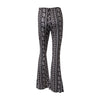 Bohemian flare leg pants for women in vibrant floral print, perfect for casual or festival wear in spring and summer.
