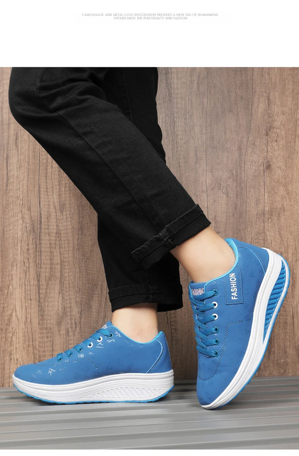 Chunky platform wedge sneakers paired with flowy dress outfit