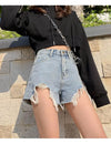 Women's casual denim shorts with frayed hem and vintage distressed finish
