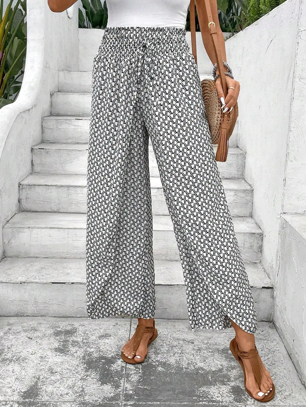 Floral wide-leg chiffon pants for women, ankle-length, elastic waist, perfect for summer casual and office wear.
