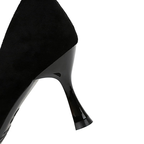 Versatile black dress heels suitable for office and events.