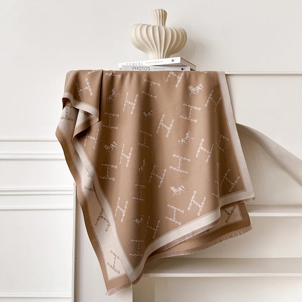 Portable cashmere wrap with beautiful floral print, perfect for travel.