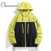 Men's waterproof hiking and urban windbreaker jacket with hood, full-zip closure, and oversized fit for all seasons.