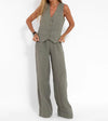 Model confidently walking in the Radiant Summer Suit, exuding authority.