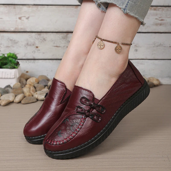 Brown leather loafers with floral embellishment and anti-slip sole for women