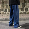 Softened denim wide-leg jeans featuring elastic waist and quality craftsmanship