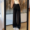 Full length view of corduroy high waist pants displaying vintage-inspired texture and modern fit