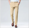 Business professional sitting comfortably in stretch dress pants during office meeting