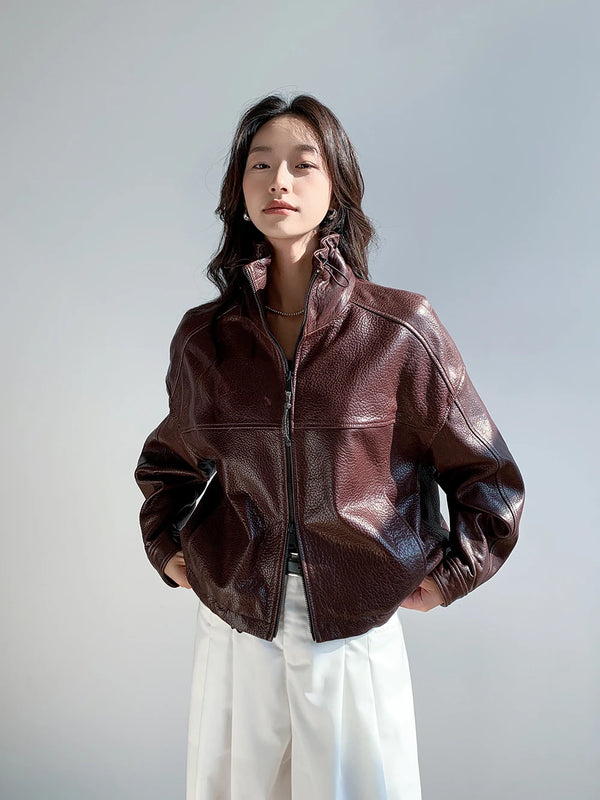 Front view of the tailored fit of the vintage leather cropped jacket for women.