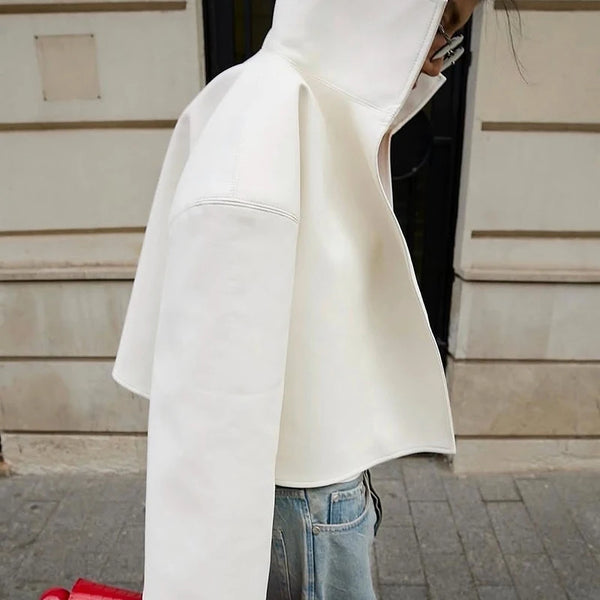 Single-breasted PU leather jacket with structured collar and loose fit