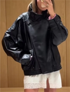 Chic black faux leather moto jacket for women, perfect for autumn evenings and stylish casual wear with functional pockets.