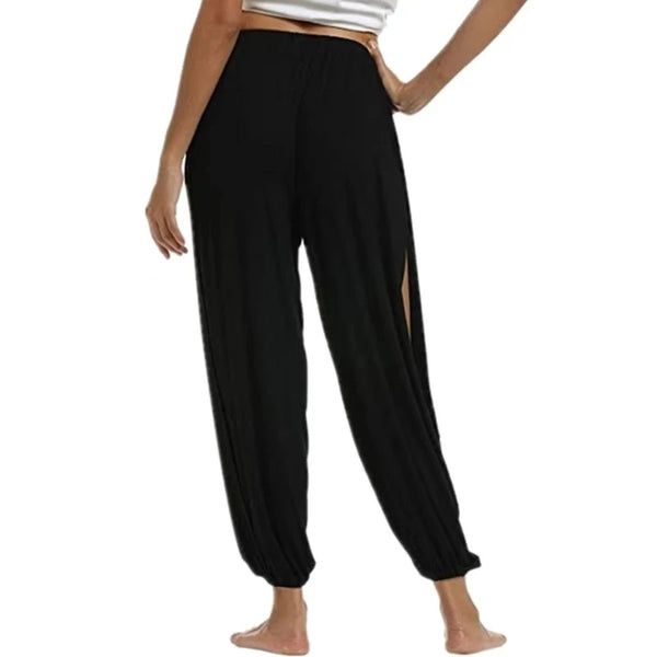 Chic high-waisted slit yoga pants for women, perfect for yoga, gym, or casual wear with breathable, stretchy fabric.