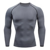 Men's breathable compression fitness t-shirt in black, perfect for workouts, running, and outdoor training with moisture-wick