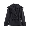 Belted trench coat in neutral tone with timeless double-breasted design
