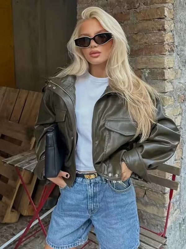 Chic army green faux leather jacket for women with stand collar, loose fit, and functional pockets for winter style.