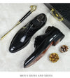 Stylish black leather Oxfords ideal for formal occasions and weddings.
