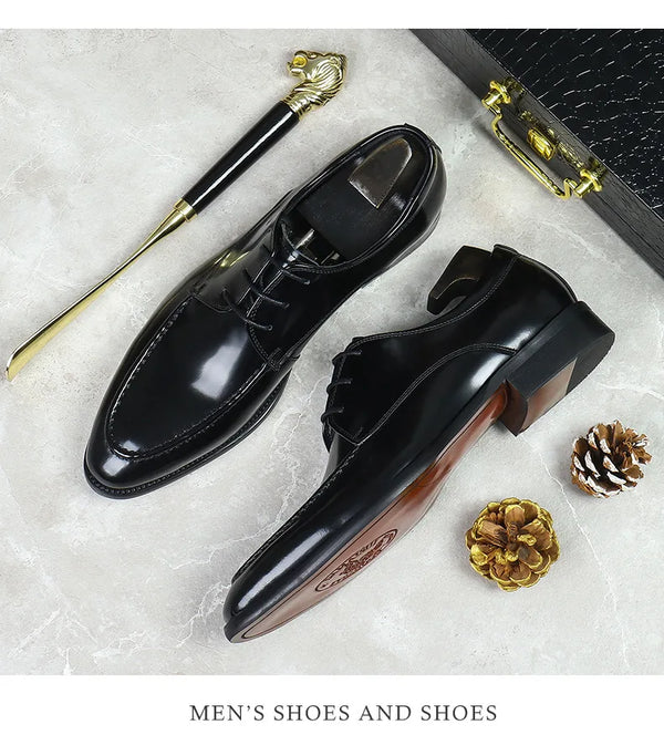 Stylish black leather Oxfords ideal for formal occasions and weddings.