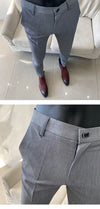 Slim fit business dress pants for men in black, khaki, and navy, perfect for autumn office wear and smart casual events.