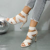 Sophisticated taupe stiletto heels with premium PU upper and open toe.