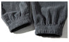 Close-up of ankle cuff detail on fleece-lined corduroy joggers