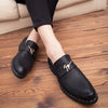 Elegant black patent leather Oxford shoes for formal events.