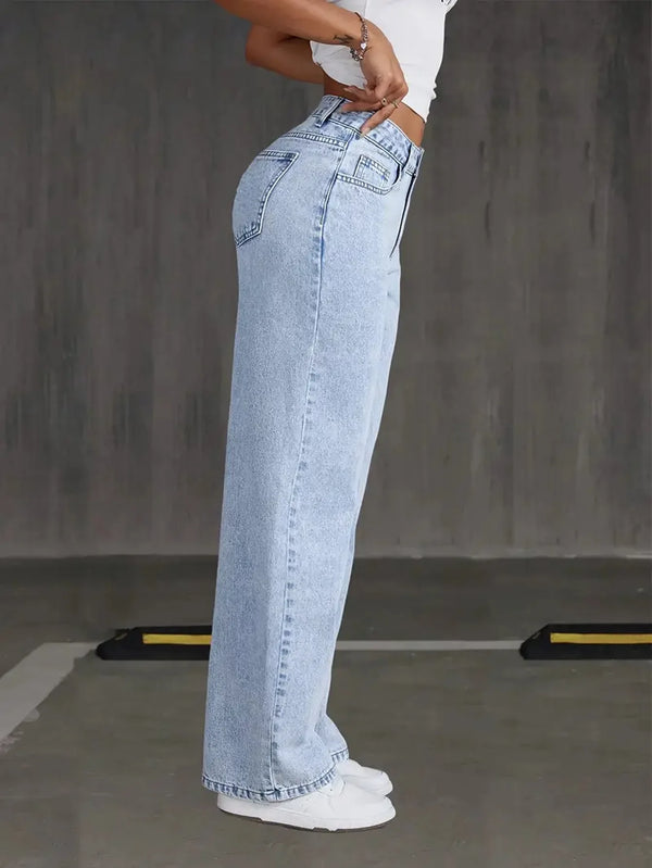 Chic wide-leg denim jeans for women, featuring a button-fly closure and light distressing for stylish everyday wear.