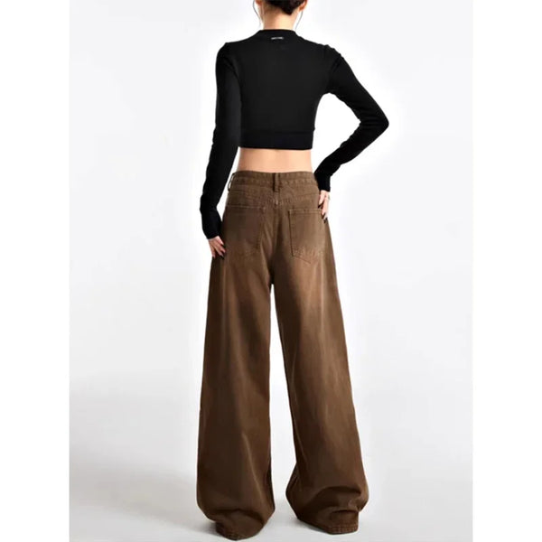 Vintage high-waist wide-leg jeans for women in light wash, featuring a button-fly closure and retro '90s style.