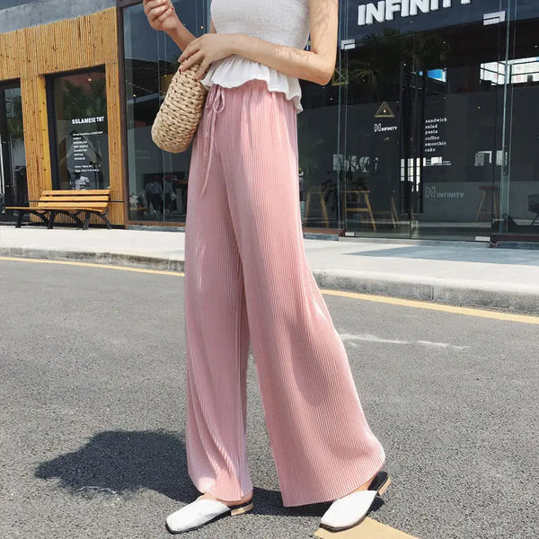Chic wide leg summer pants for women in ice silk, pleated design, lightweight, breathable, and perfect for casual outings.